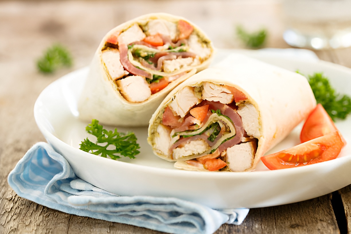 chicken wraps with bacon on a plate